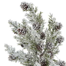 Small Snowy Fir Tree With Pincecones In Wood Log